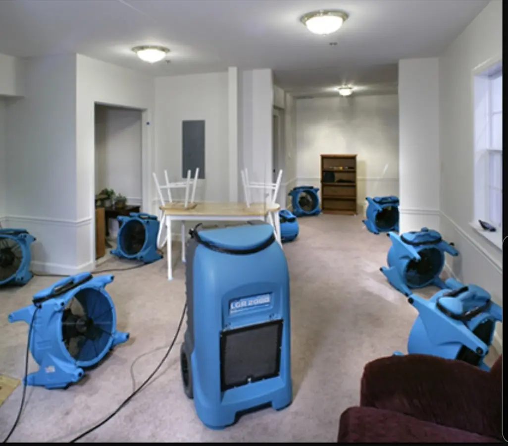 Air movers and dehumidifier setup for Water Damage Restoration in Tiffin